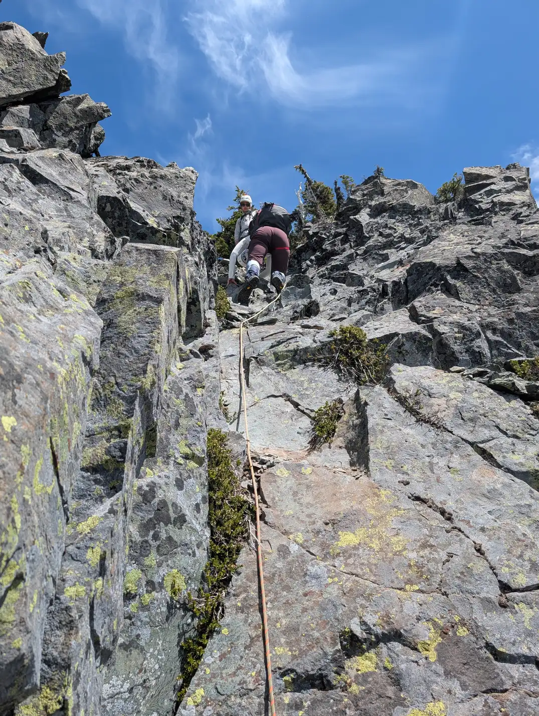 Downclimbing the final gully near the top
